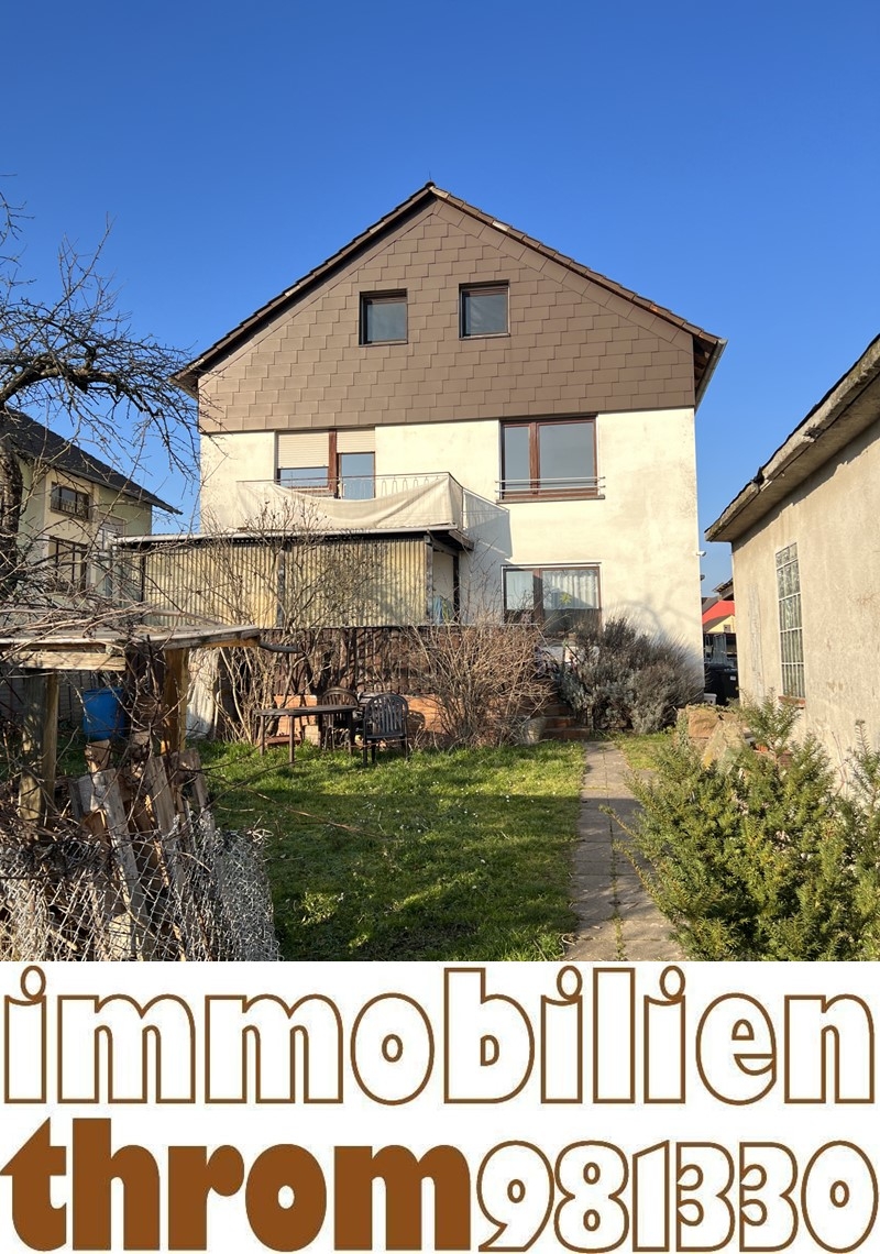 Immobilien Throm GmbH - 3-Familienhaus Stutensee-Blankenloch
